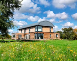 View from meadow at Halfpenny house, a Para 55, energy efficient passive house. Another grand design by Hawkes Architecture.