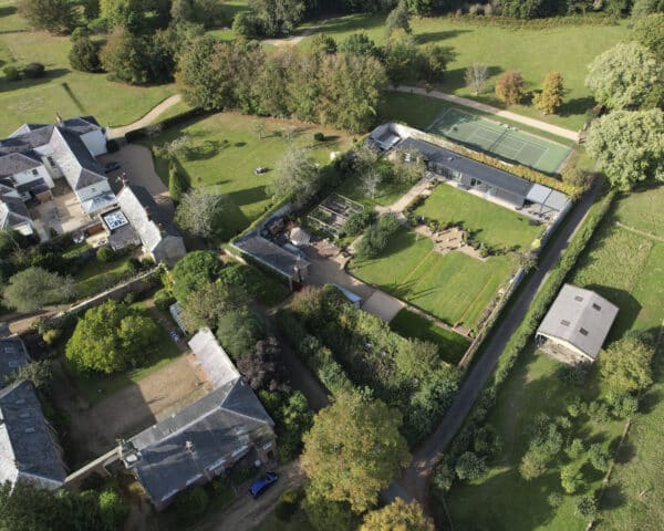 Aerial view of Walled garden, a contemporary new build within a Grade II Listed walled garden, designed by Hawkes Architecture.