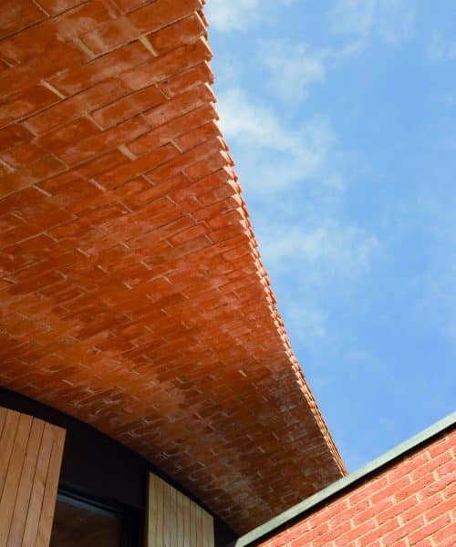 Exterior detail of the tiles on the roof at Crossway, a PPS 7, energy efficient Passivhaus. Designed by Hawkes Architecture and featured on Channel 4's Grand Designs.