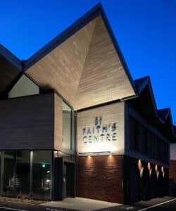 St Faith's Centre at night, a low energy new build, designed by Hawkes Architecture.