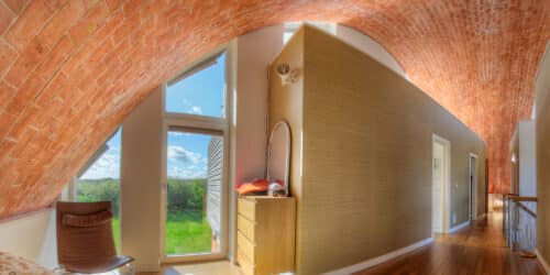 Timbrel vaulted arch interior at Crossway, a PPS 7, energy efficient Passivhaus. Designed by Hawkes Architecture and featured on Channel 4's Grand Designs.