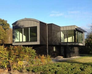 Front elevation of Stealth Barn, a contemporary passive barn designed by Hawkes Architecture.