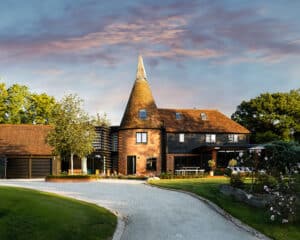 Arrival view of Whitsunden Oast, a contemporary extension & barn conversion designed by Hawkes Architecture.