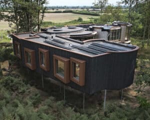 Side elevation of Tree House, a Para 55 energy efficient passive house. Another grand design by Hawkes Architecture.