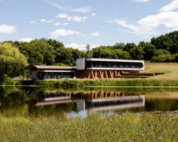 View across the water at Lake House, a Para 79 energy efficient passive house. Another grand design by Hawkes Architecture.