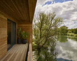 Cotswold Waters. A collection of sustainable, bespoke homes set within their own private nature reserve at Cotswolds Waters. Each home looks onto the outstanding natural beauty of wild, plush greenery, watercourses and stunning lake views set in a 110-acre estate.