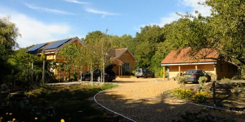 Arrival view of Horton Wood, an eco extension & transformation project by Hawkes Architecture Ltd