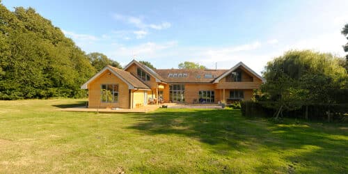 Rear view of Horton Wood, an eco extension & transformation project by Hawkes Architecture Ltd